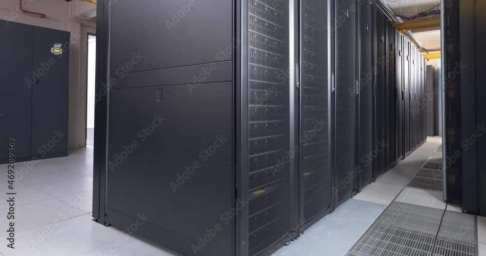 Video of empty corridor with rows of computer servers Video of empty corridor with rows of computer servers