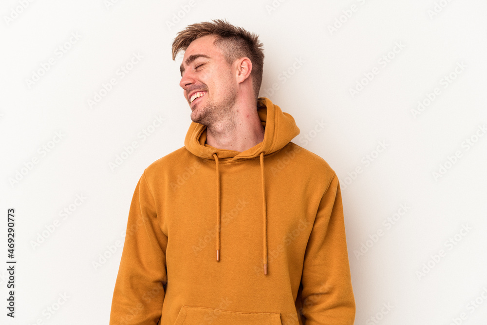 Young caucasian man isolated on white background dancing and having fun. Young caucasian man isolated on white background dancing and having fun.