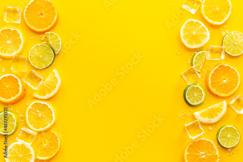 Slices citrus fruits pattern for making cocktail or juice, top view