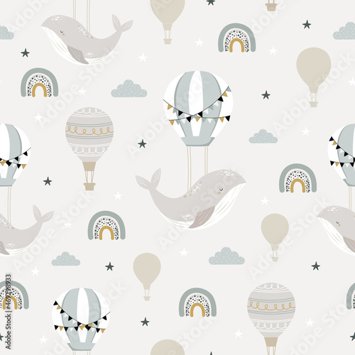 Sleeping whales, hot air ballon and rainbow seamless childish pattern. Hand drawn repeat pattern for wrapping, fabrik, paper or textile projects. Vector illustration.