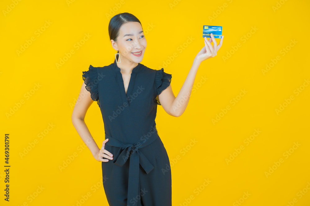 Portrait beautiful young asian woman smile with credit card