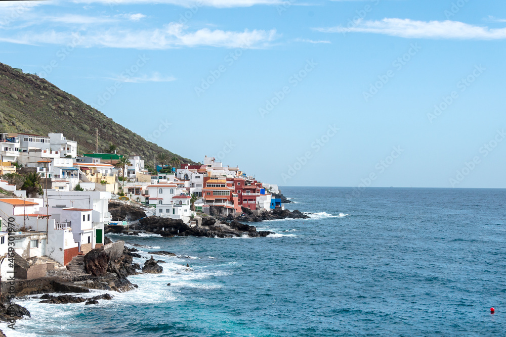 Typical houses on the rocks by the sea in Tenerife. Canary Islands.