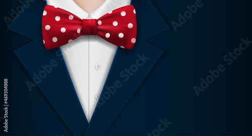 Man in suit and bow tie with polka dots pattern