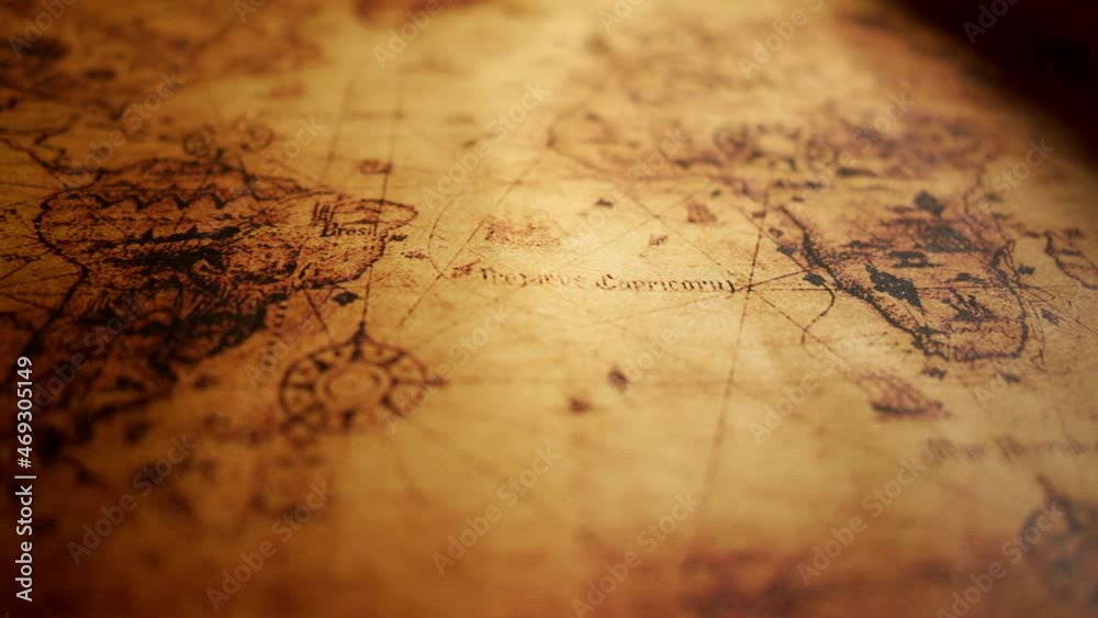 Close up of a old vintage map with countries and continents. Retro style. Concept of geography or global history and cartography.