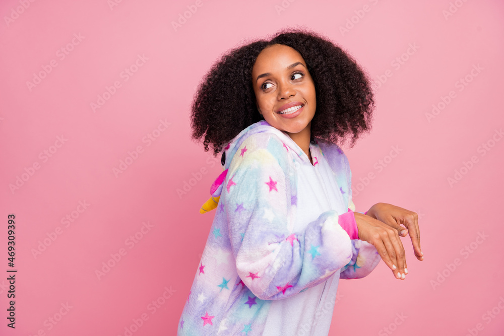 Profile side photo of young lovely african woman have fun wondered look empty space playful isolated over pink color background Profile side photo of young lovely african woman have fun wondered look empty space playful isolated over pink color background