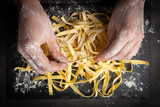 Italian pasta cooking process. Fresh food concept. Home made tagliatelle