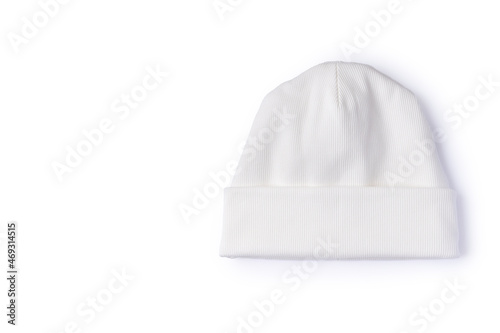 White beanie hat isolated on white background. Top view of trendy youth headwear with copy space