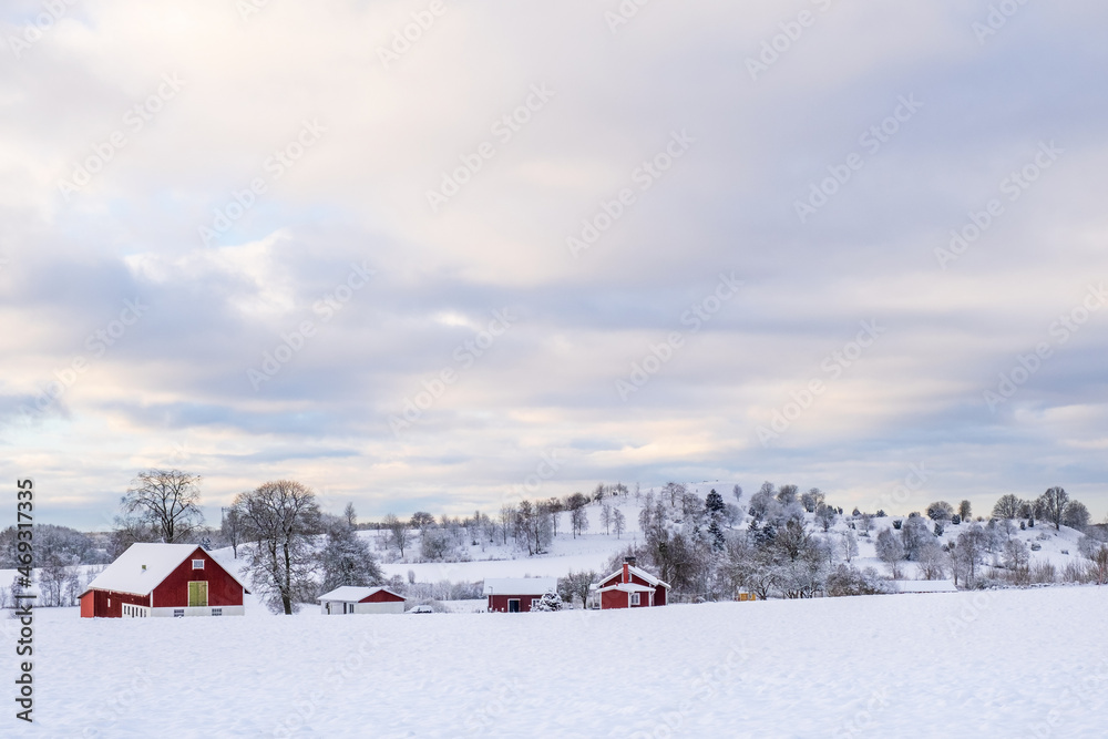 Rural landscape view with a farm in the winter Rural landscape view with a farm in the winter