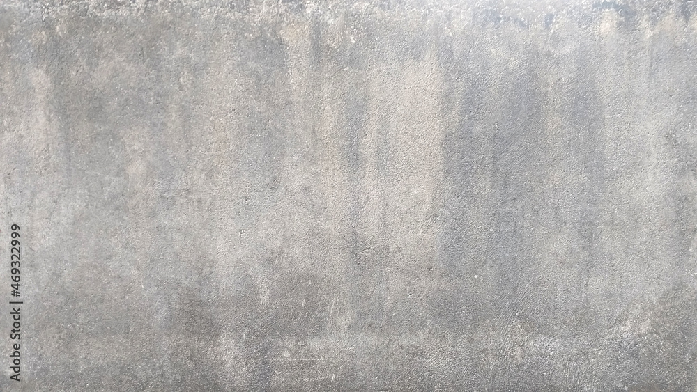 surface of gray cement wall for the design texture background.