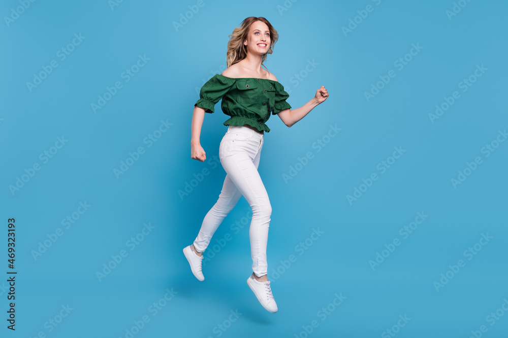 Profile photo of dreamy lady jump hurry run wear bear shoulders green blouse isolated blue color background