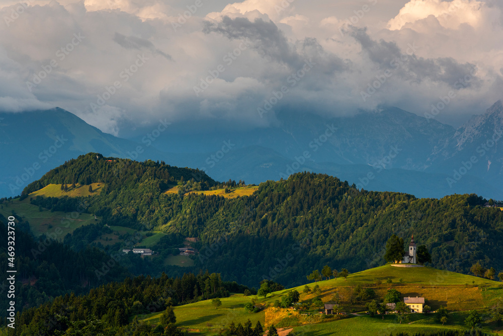  Sveti Tomaz (Saint Thomas) Church in Slovenia. Hilltop Landmark with Julian Alps Mountains in Background