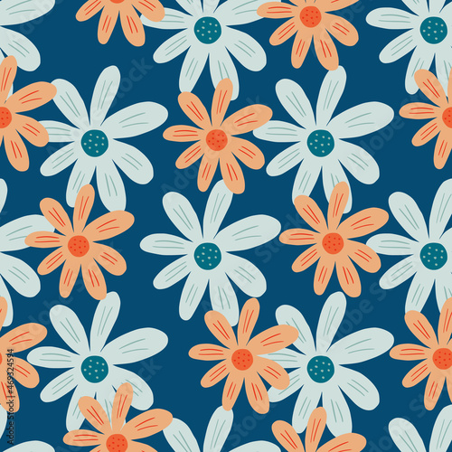 Creative ditsy flowers seamless pattern on blue background. Floral ornament.