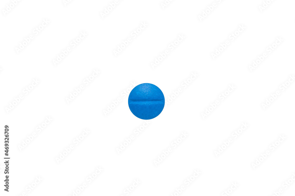 Blue round pill isolated on a white background. A small round mass of solid medicine. Blue round pill isolated on a white background. A small round mass of solid medicine.