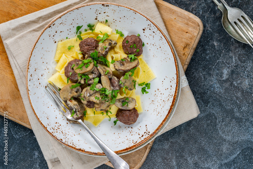 Venison meatballs with creamy mushroom sauce and pappardelle pasta photo