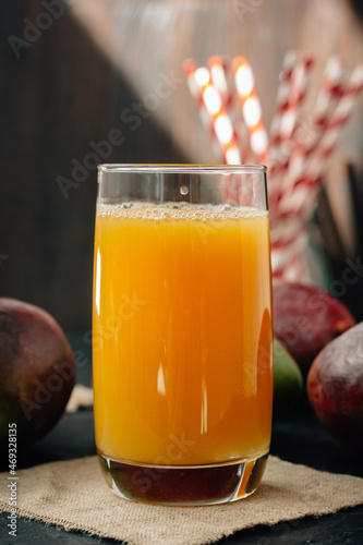 Mango juice in a glass, fresh fruit drink