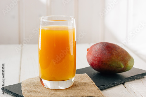 Mango juice in a glass, fre...