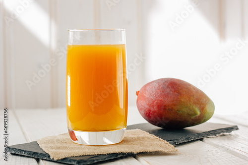 Mango juice in a glass, fre...
