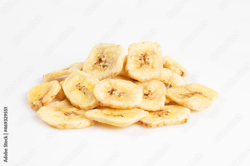 Dried banana chips isolated on white backgrond