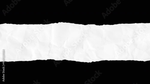 White strip of torn paper on black background. Realistic cartoon wrinkled surface texture in modern trendy stop motion style. Fashion minimal abstract dynamic art animation. photo