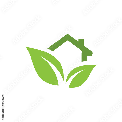 Green house with leaves vector logo icon. Eco friendly home symbol.