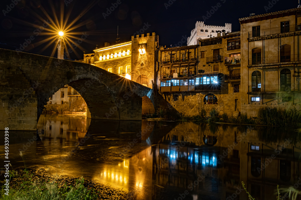 Night photography of the medieval bridge of Valderrobres at night, Matarraña, Teruel, Spain