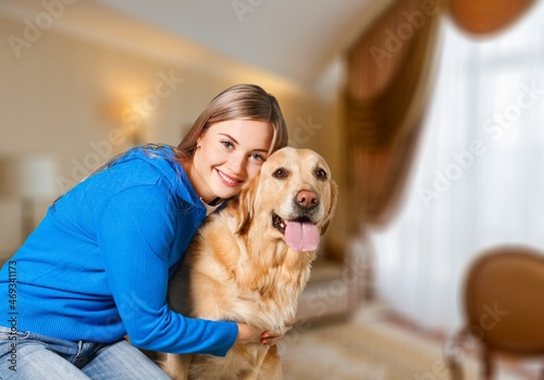 Wallpaper Mural Fluffy dog with its owner young woman, happy playing while staying home, Torontodigital.ca