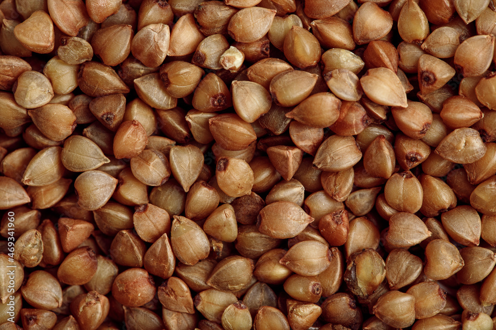 Full frame macro photo of buckwheat groats. Healthy eating concept Full frame macro photo of buckwheat groats. Healthy eating concept