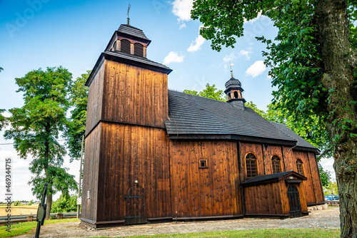 Lubowo, Poland - August 09, 2021. Old wooden st. Mikolaj Church - Kosciol pw. sw. Mikolaja