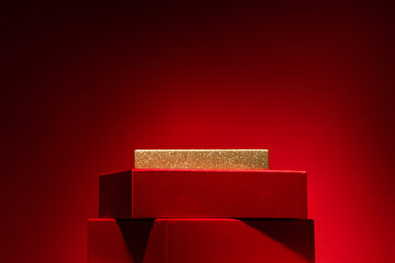 Majestic red podium made of gift boxes Red background ..
