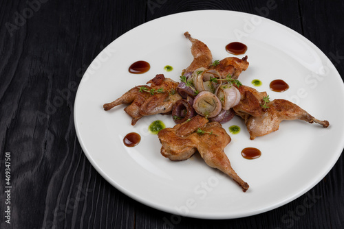 Roasted quails with vegetab...