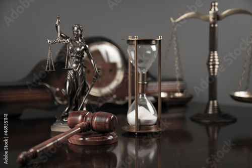 Judge office. Law and justice symbols composition: judge’s gavel, Themis sculpture and scale.