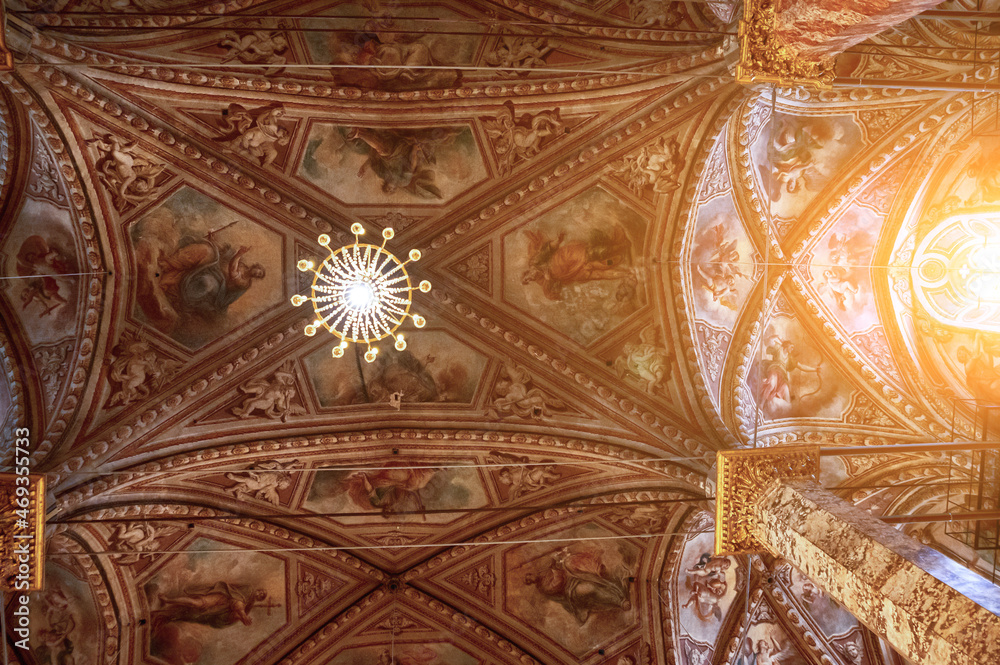 Perugia, Umbria, Italy. August 2021. Interior of the Cathedral of San Lorenzo. Detail of the richly frescoed vaults.
