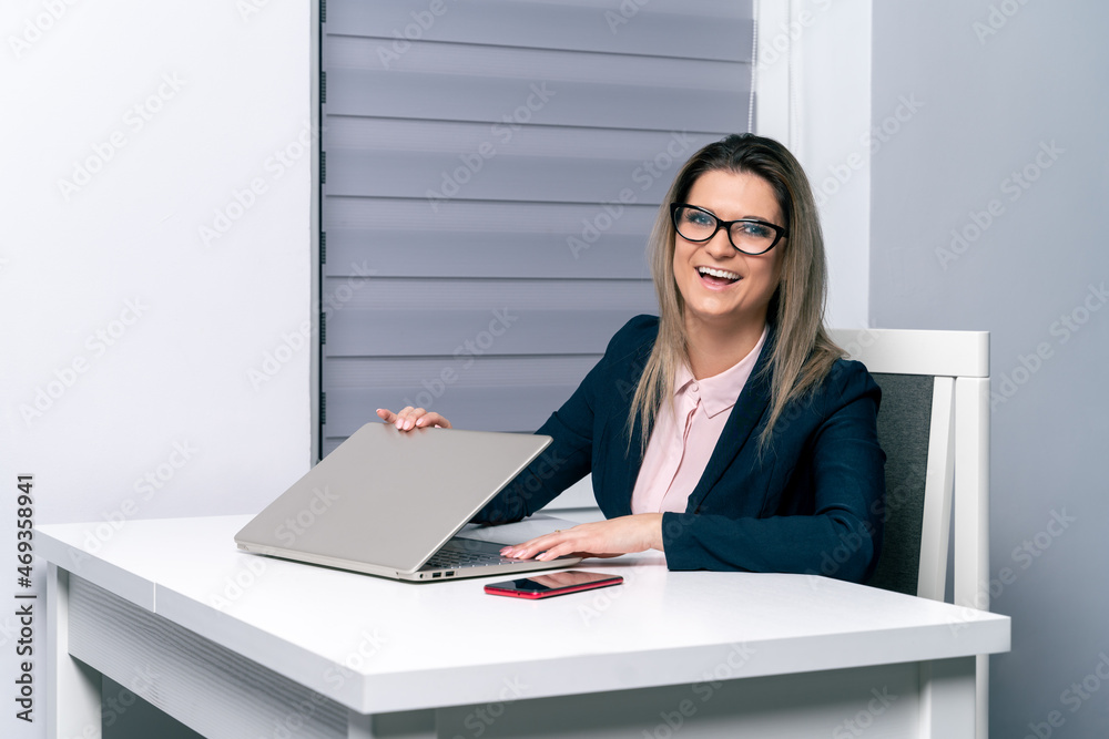 Happy business woman, finishing work and closing laptop Happy business woman, finishing work and closing laptop