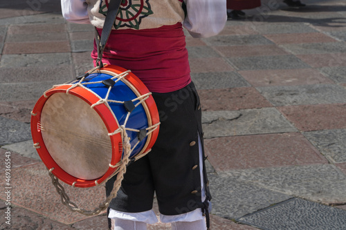 Man in Asturian costume playing the drum in a square in the city of Oviedo, Uvieu, in Asturias.