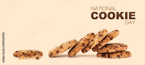 Cookie Day banner with a lot of delicious chocolate chip cookies on a creamy color background