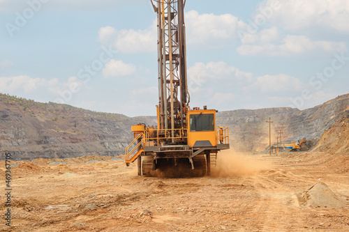 Machine for drilling wells in the quarry. Drilling of boreholes for laying an explosion in a quarry. Technologies of open-pit mining of minerals.