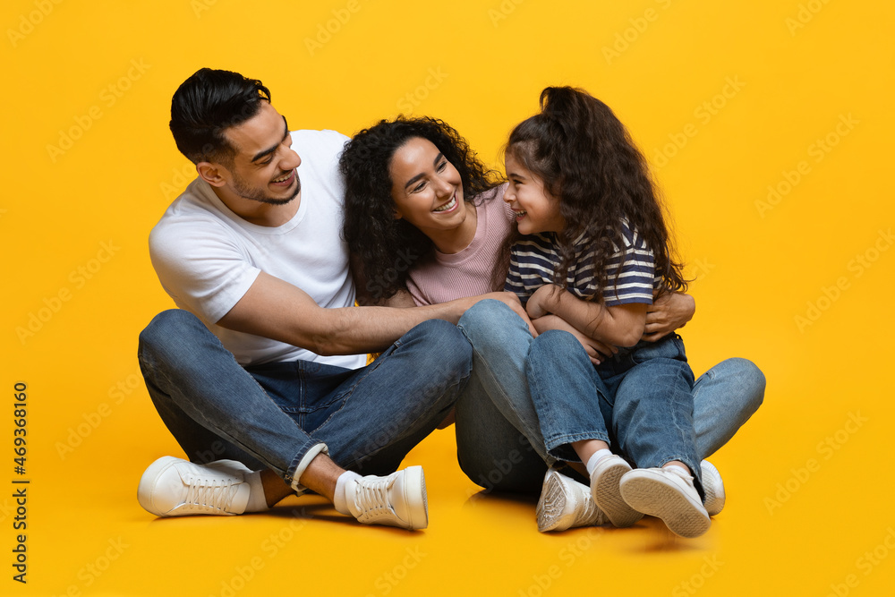 Happy Loving Middle Eastern Family Of Three Having Fun Together In Studio Happy Loving Middle Eastern Family Of Three Having Fun Together In Studio
