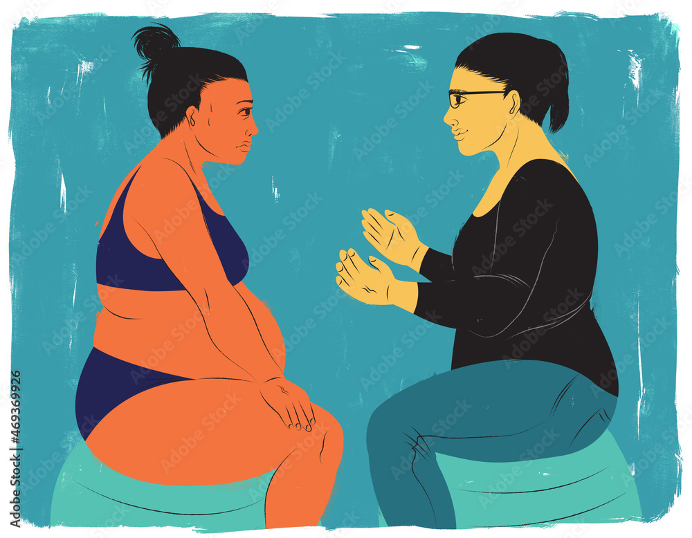 Doula sitting across from mother in labor offering help and comfort Doula sitting across from mother in labor offering help and comfort