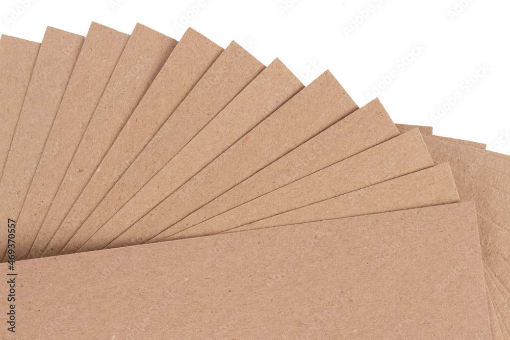 Set of cardboard layer pads, sheets of recycled paperboard isolated on