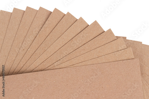 Set of cardboard layer pads, sheets of recycled paperboard isolated on white. Environmentally friendly paper packaging. Packaging for safe transportation photo