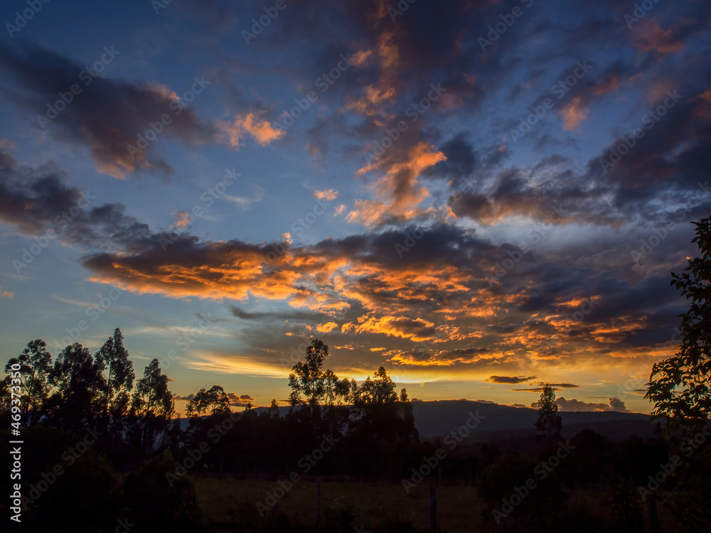 The colors of the afterglow on different kinds of clouds over the valley near the town of Villa de Leyva in central Colombia.