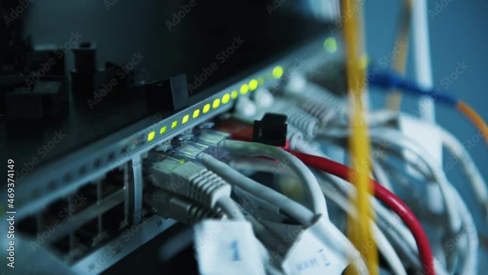 Close up view of internet equipment and cables in the server room Close up view of internet equipment and cables in the server room