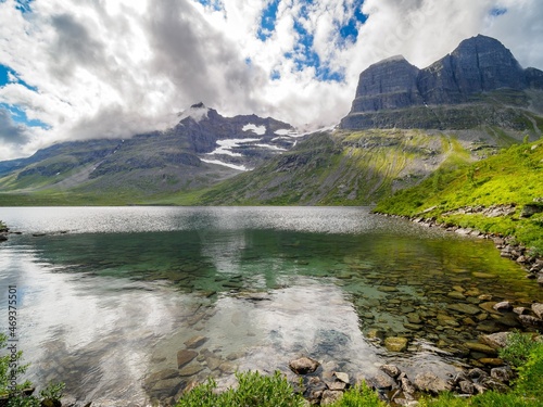 Storvatnet Lake and the mountain peaks surrounding. Innerdalen mountain valley of Norway