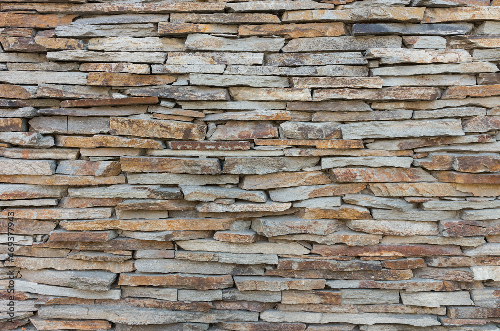 Wall made of irregular stones - background Wall made of irregular stones - background
