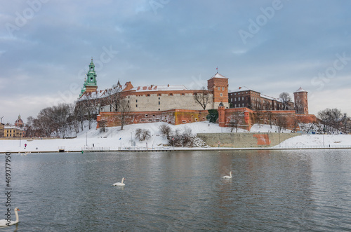Krakow winter, Wawel Castle over Vistula river, snow, Poland
