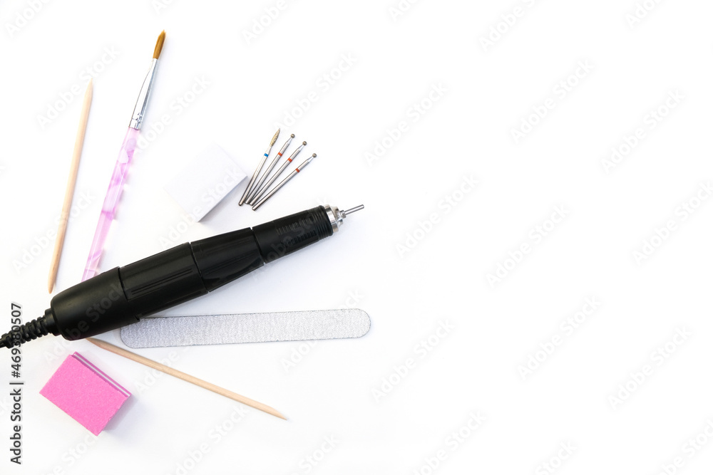 tools for manicure, nail care apparatus, wooden stick, nail file on white isolated background tools for manicure, nail care apparatus, wooden stick, nail file on white isolated background