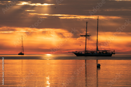 Fototapeta Naklejka Na Ścianę i Meble -  sailing ship bathed in golden light