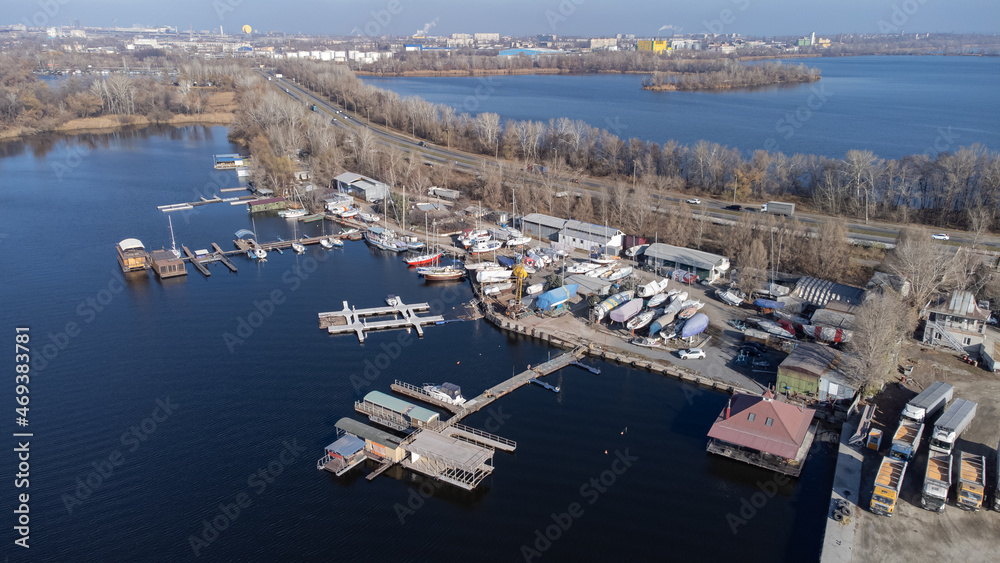 Marina for yachts on the river bank. View from the bird's flight height.