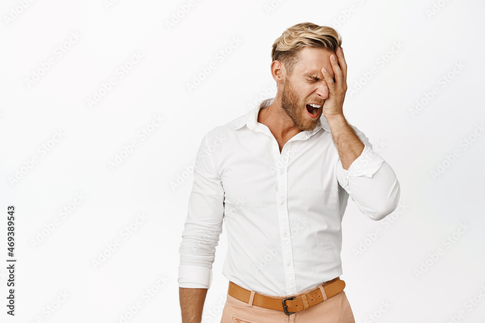 Frustrated Human Failure. Frustrated blond man feeling disappointment, facepalm and ...