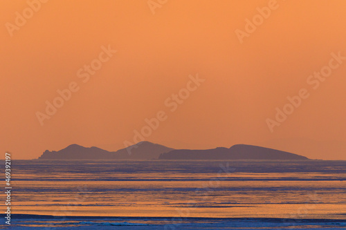 Picturesque islands in the Sea of Japan during a bright sunset. Beautiful seascape.